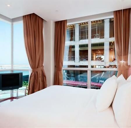 Hilton Baynunah Hotel Абу-Даби Номер фото